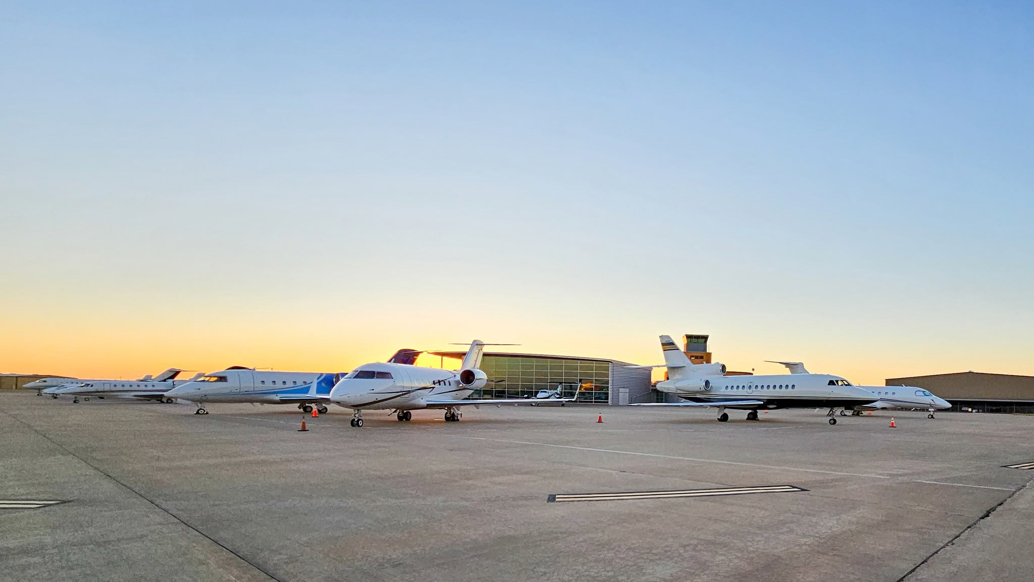 Photo of sunset on the LBB ramp with a variety of jets